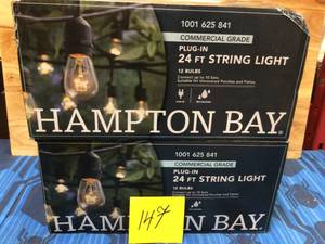 lot 147 image: Lot of 2 12-Light 24 ft. Black Commercial Incandescent String Light by Hampton Bay
