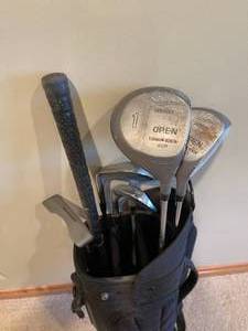 lot 99 image: Datrek Golf Bag With Some Used Clubs