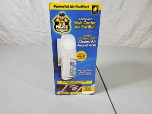 lot 37 image: New Air Police Wall Outlet Air Purifier