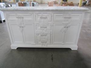 lot 109 image: Home Decorators Collection Windlowe 61 in. W x 22 in. D x 35 in. H Bath Vanity in White with Carrera Marble Vanity Top in White with White Basin Model 15101-VS61C-WT- Cracked Top.