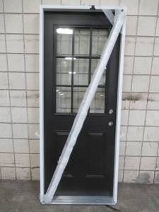 lot 514 image: Masonite 32 X 80 Steel Exterior Door, Black, LH Swing, 12 Lite With External Grill, Double Bore, Nickel Hinges - Slight Dents.