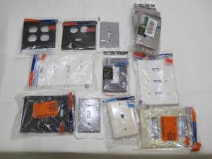 lot 346 image: Box Lot of Assorted Light Switch & AC Outlet Wall Plates - 24 LBS - Black and White