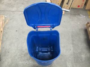 lot 395 image: Rubbermaid 45 Gal. Roughneck Blue Wheeled Recycling Trash Container