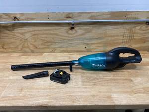 lot 63 image: MAKITA 18-Volt LXT Lithium-ion Handheld Cordless Vacuum with Battery