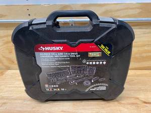 lot 112 image: HUSKY 38 in. Drive 100-Position Universal SAE and Metric Mechanics Tool Set (60-Piece) (missing a couple of pieces)