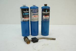 Torch tip and propane bottles