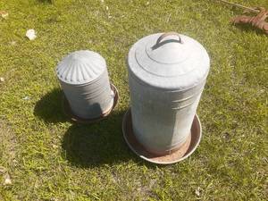 lot 103 image: (2) Metal Vintage Feeders See Phot...