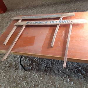 lot 195 image: (2) Vintage McCormick Deering Signs...
