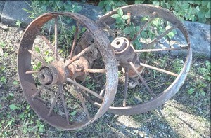 lot 32 image: (2) Vintage Steel Wheels See Photo...