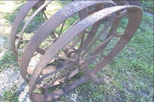 lot 38 image: Vintage Corn Planter Wheels 30...