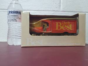 lot 21 image: 1925 Kenworth Do It Best Die cut Coin Bank Diecast