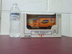 lot 22 image:  Our Own Hardware 1931 Hawkeye Truck Delivery Coin Bank Diecast