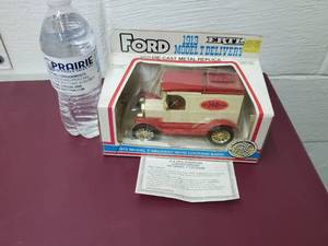 lot 23 image:  Our Own Hardware 1913 model t delivery bank diecast