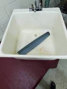 lot 24 image: Utility sink with legs