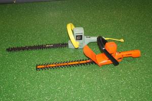 lot 21 image: 2 Electric Hedge Trimmers