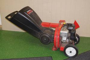 lot 1 image: Yard Machines 5 HP 3-Way Wood Chipper