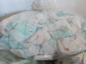 Box of 100 or so Diapers 0 -3 month...