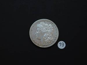 lot 19 image: 1882-S AU Morgan Silver Dollar