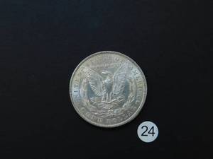lot 24 image: 1885 BU Morgan Silver Dollar