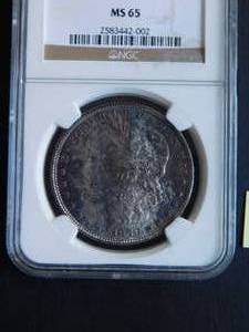 lot 90D image: 1879-S Morgan Dollar NGC MS65 EXTREME TONING on OBV