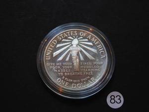 lot 83 image: 1986-S Proof Statue of Liberty Silver Comm. Dollar Price Guide $39.00