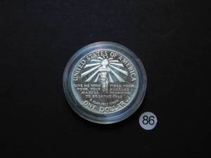 lot 86 image: 1986-S Proof Statue of Liberty Silver Comm. Dollar Price Guide $39.00