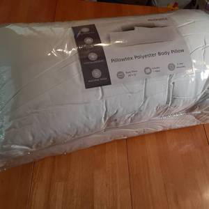 lot 56 image: New in zippered case is a Pillowtex...