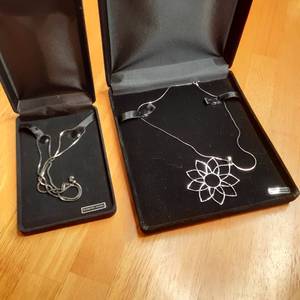 lot 76 image: Set of 2 Sterling silver necklaces....