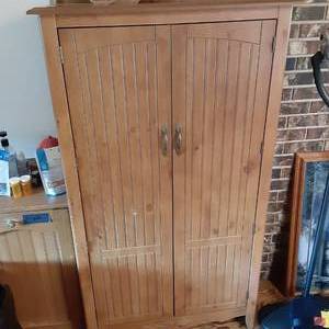 lot 126 image: Solid Wood Pantry Cabinet with bras...