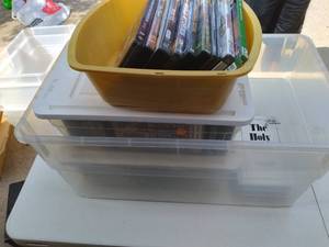 lot 319 image: DVDs, VHS, and cassett...