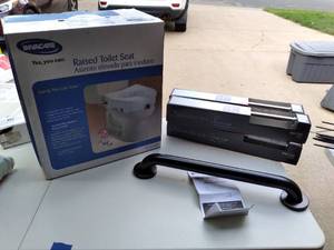 lot 335 image: Invacare Raised Toilet Seat in Box,...