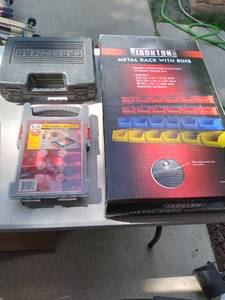 lot 348 image: New in box metal rack with bins, pr...