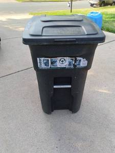 lot 388 image: Toter Two Wheel Garbage Can...