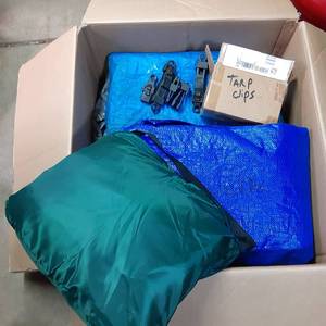 lot 195 image: Large box of tarps, tarp clips and ...