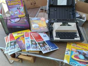 lot 409 image: Typewriter in Case, CDDVD Labeling Supplies and More See Photos