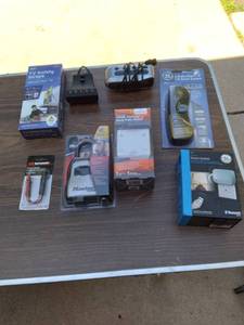 lot 411 image: GE Plug IN Smart Switch, AudioVideo & Game Switch, Small Alarm Clock, Electric Tens Therapy & Heat Pain Relief, TV Safety Straps, Master Lock Key Storage, Circut Tester