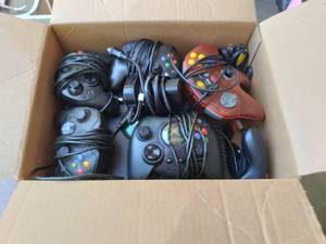 lot 418 image: X-Box Original With Battery Chargers for Controller & Additional Controllers, Power Cords See Photos Powers On