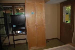 lot 604 image: Nice large sized Wood cabinet measu...