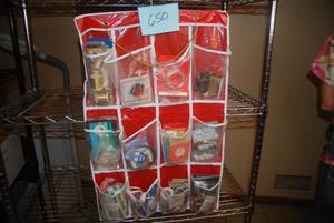 lot 650 image: Hanging Door Storage Bin Full of Cr...