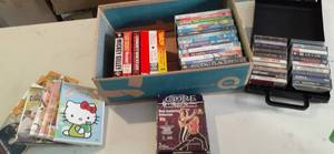 lot 247 image: Box of DVDs, VHS, and Cassette tap...
