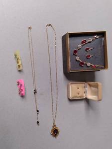 lot 505 image: 14k Solid Gold and red stone earrin...