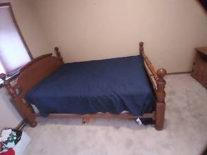lot 507 image: Vintage medium tone Wood bed frame....