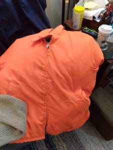 lot 543 image: A Blaze Orange hunting style jacket...