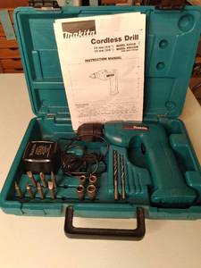 lot 561 image: Makita 10mm Cordless Drill model 60...