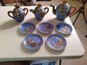 lot 576 image: In shades of Blue and Gold is a set...