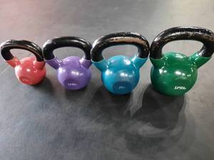 lot 11 image: Set of 4 SPRI Exercise Workout Fitness Gym Kettlebells  Kettle Bells - 10 lb  15 lb  20 lb  &  25 lb