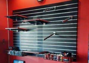 lot 60 image: Commercial-Grade Slatwall Slat Wall Retail Display with Metal Inserts & Extra Hooks Hangers and Shelves as Pictured