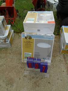 lot 7 image: Store return lighting fixtures. Some boxes have been opened. As shown.