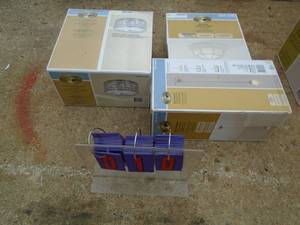 lot 10 image: Store return lighting fixtures. Some boxes have been opened. As shown.
