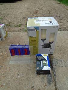 lot 12 image: Store return lighting fixtures. Some boxes have been opened. As shown.